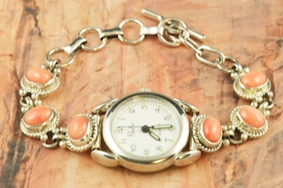 Genuine Coral set in Sterling Silver Quartz Watch Bracelet. Created by Navajo Artist Tony Garcia.